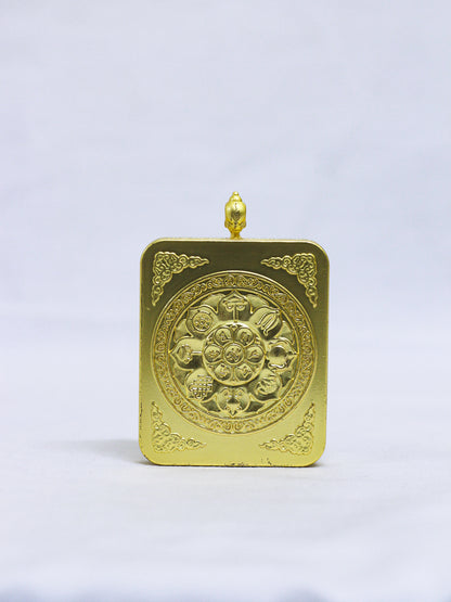 Back of the Shakyamuni Buddha butti thangka pendant engraved with the Eight Auspicious Symbols and sacred lotus motif.
