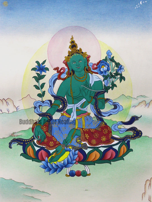 Green Tara Thangka seated on a lotus with traditional Buddhist iconography depicting the compassionate Female Buddha.