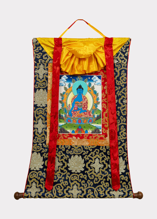 Decorative scroll with a colorful design featuring Medicine Buddha 